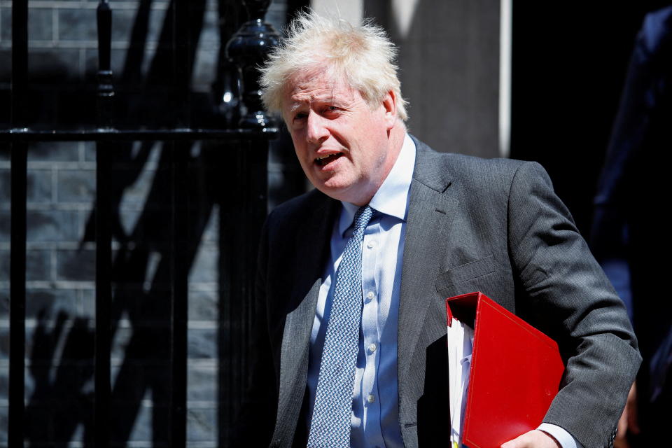 British Prime Minister Boris Johnson leaves 10 Downing Street to take questions in parliament, in London, Britain June 15, 2022. REUTERS/Peter Nicholls