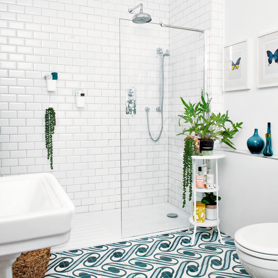 White bathroom with blue floor tiles