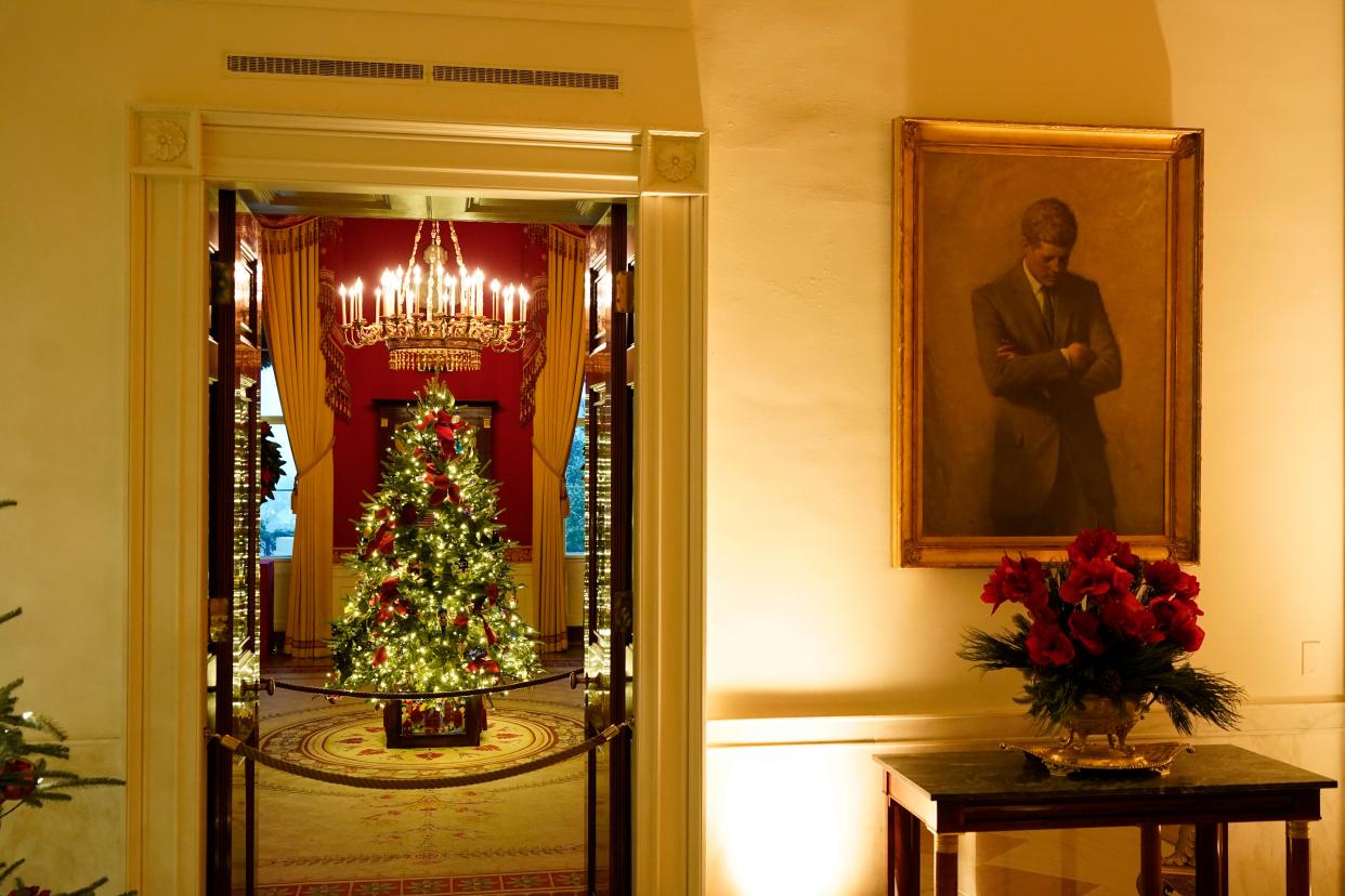 JFK’s portrait hangs outside the Red Room of the White House, but this year the image is also on Christmas tree decorations in the Vermeil Room (AP)