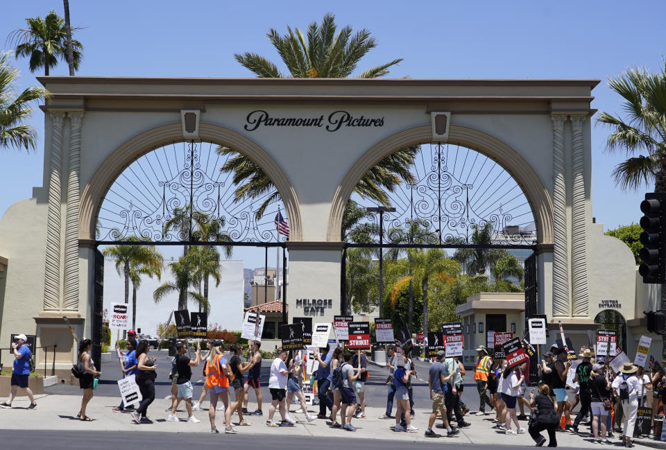 Striking writers and actors take part in a rally outside Paramount studios in Los Angeles on Friday, July 14, 2023. This marks the first day actors formally joined the picket lines, more than two months after screenwriters began striking in their bid to get better pay and working conditions. (AP Photo/Chris Pizzello)