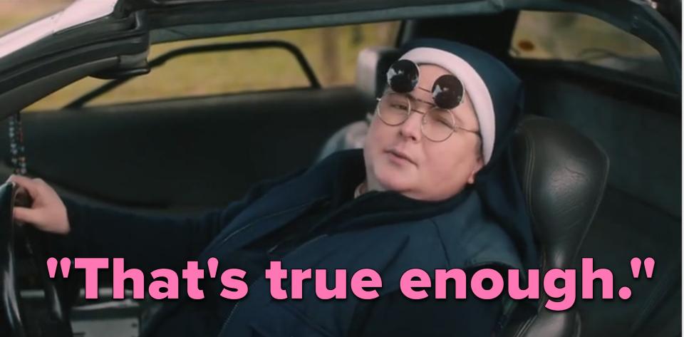 Sister Michael from "Derry Girls" sits in a car with flip-up sunglasses on. She looks out the window and says "That's true enough."