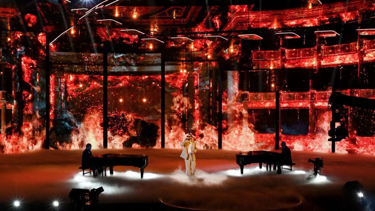 TOPSHOT - French singer Julien Schwarzer aka SCH performs on stage during the 37th Victoires de la Musique, the annual French music awards ceremony, at the Seine Musicale concert hall in Boulogne-Billancourt, on the outskirts of Paris, on February 11, 2022. (Photo by BERTRAND GUAY / AFP) (Photo by BERTRAND GUAY/AFP via Getty Images)