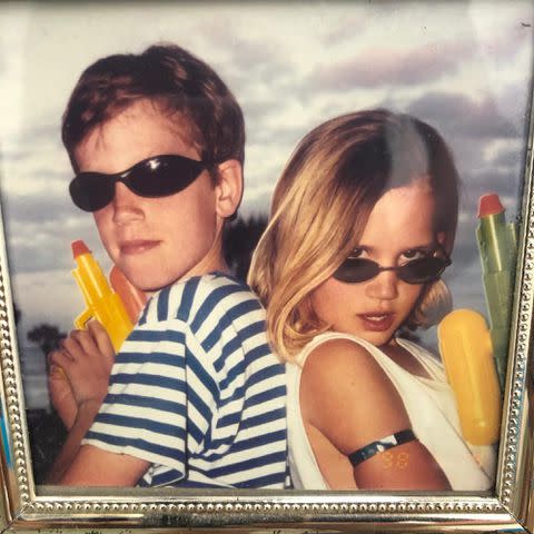 <p>Lana Del Rey Instagram </p> Lana Del Rey's siblings Charlie Grant and Caroline "Chuck" Grant pose for a picture as children