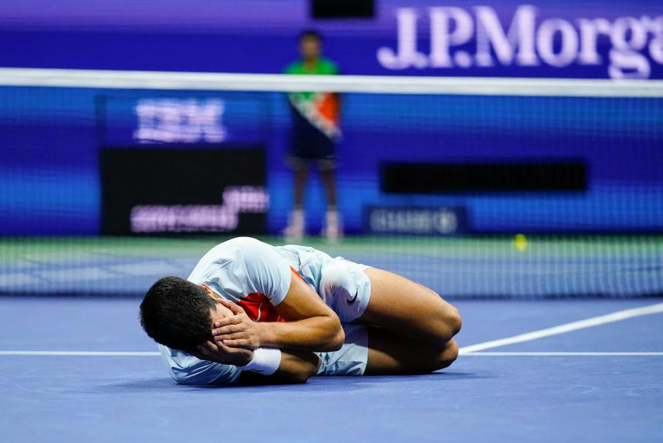 Carlos Alcaraz, of Spain, reacts after defeating Casper Ruud, of Norway, to win the men's singles final of the U.S. Open tennis championships, Sunday, Sept. 11, 2022, in New York. (AP Photo/Matt Rourke)