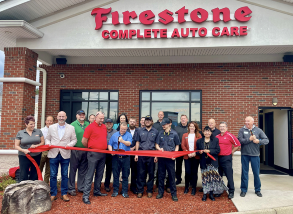 Bridgestone, Boys & Girls Club of Oak Ridge, Oak Ridge Chamber of Commerce and others cut the ribbon March 3 to mark the grand opening of Firestone Complete Auto Care.