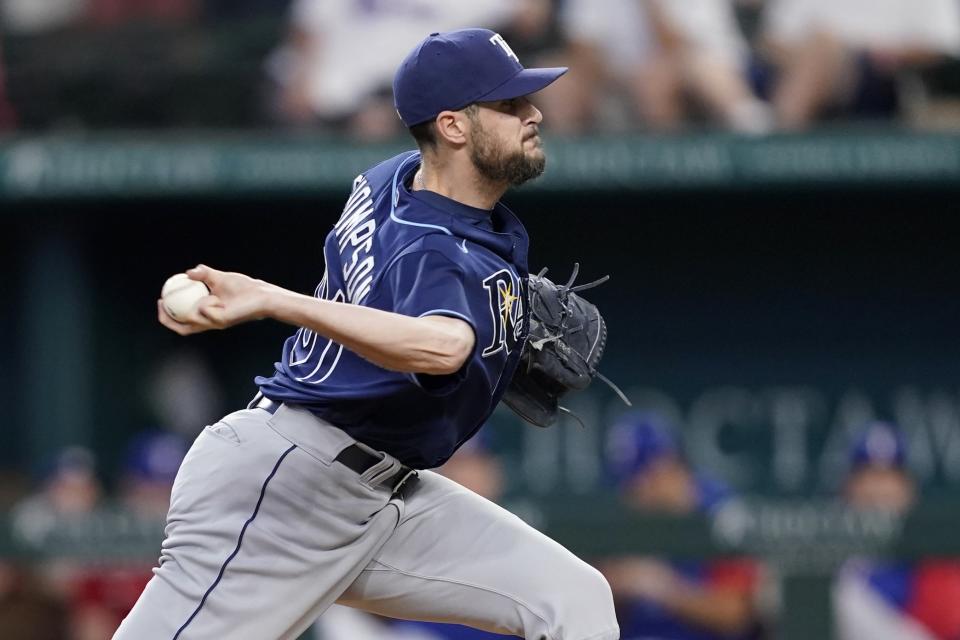 Tampa Bay Rays relief pitcher Ryan Thompson throws to the Tampa Bay Rays in the ninth inning of a baseball game, Thursday, June 2, 2022, in Arlington, Texas. (AP Photo/Tony Gutierrez)