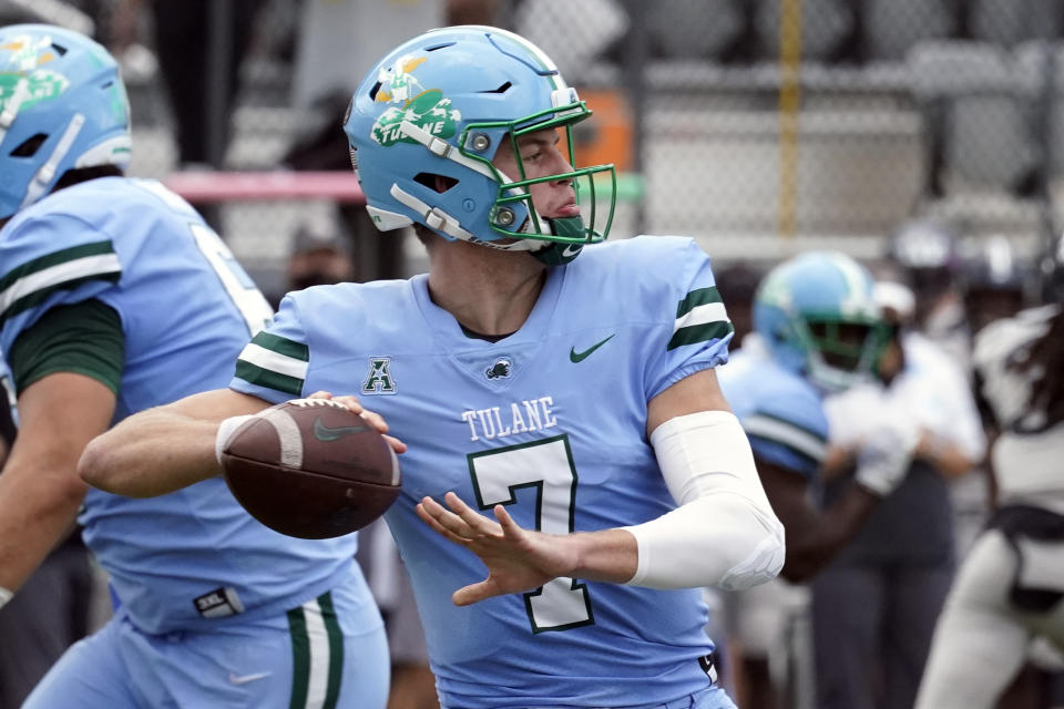 Tulane quarterback Michael Pratt throws a pass against Central Florida during the first half of an NCAA college football game, Saturday, Oct. 24, 2020, in Orlando, Fla. (AP Photo/John Raoux)