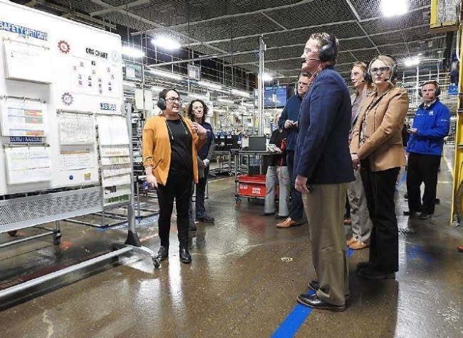 Tyra Woodruff, industrial engineering manager for Whirlpool Corp., in Findlay, discusses operations at the plant with Lt. Gov. Jon Husted. (LOU WILIN / The Courier)