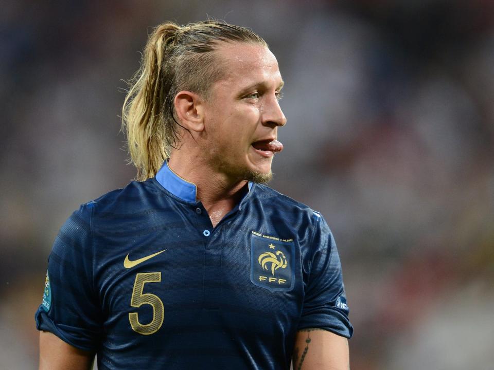 French defender Philippe Mexes sticks out his tongue during the Euro 2012 championships football match France vs England on June 11, 2012 at the Donbass Arena in Donetsk.