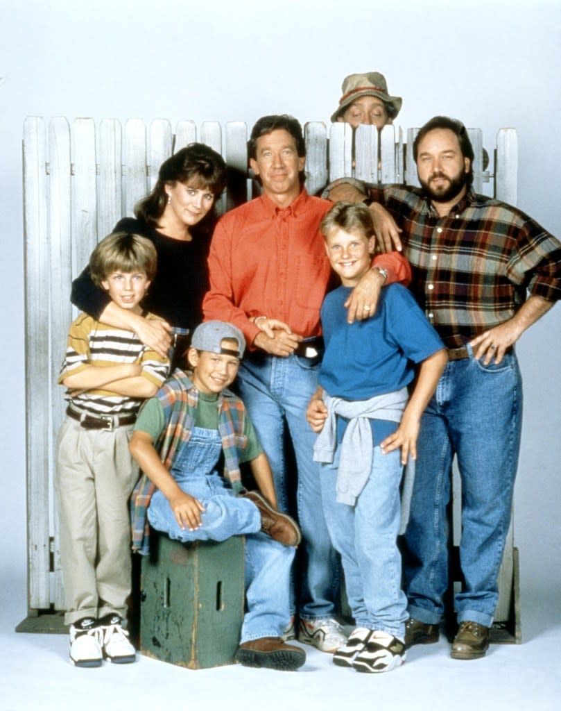 The cast of “Home Improvement”: Taran Noah Smith (from left), Patricia Richardson, Jonathan Taylor Thomas, Tim Allen, Zachery Ty Bryan, Earl Hindman and Richard Karn. ©ABC/Courtesy Everett Collection