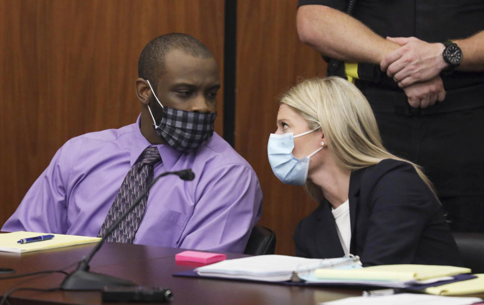 Defendant Nathaniel Rowland speaks with his attorney, Alicia Goode, during his trial in Richland County Court on July 20, 2021, in Columbia, S.C. (Tracy Glantz / The State via AP)