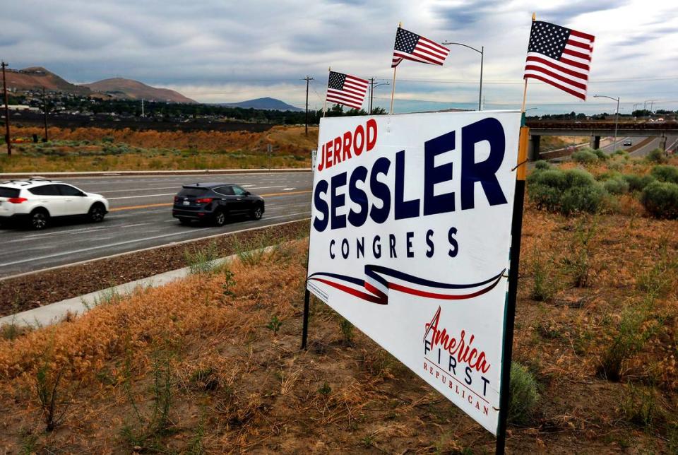 Traffic streams past a campaign sign for Jerrod Sessler near the intersection of Clearwater Avenue and Steptoe Street in west Kennewick.