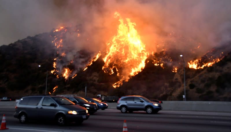 The Getty Fire burns near the Getty Center along the 405 freeway north of Los Angeles, California