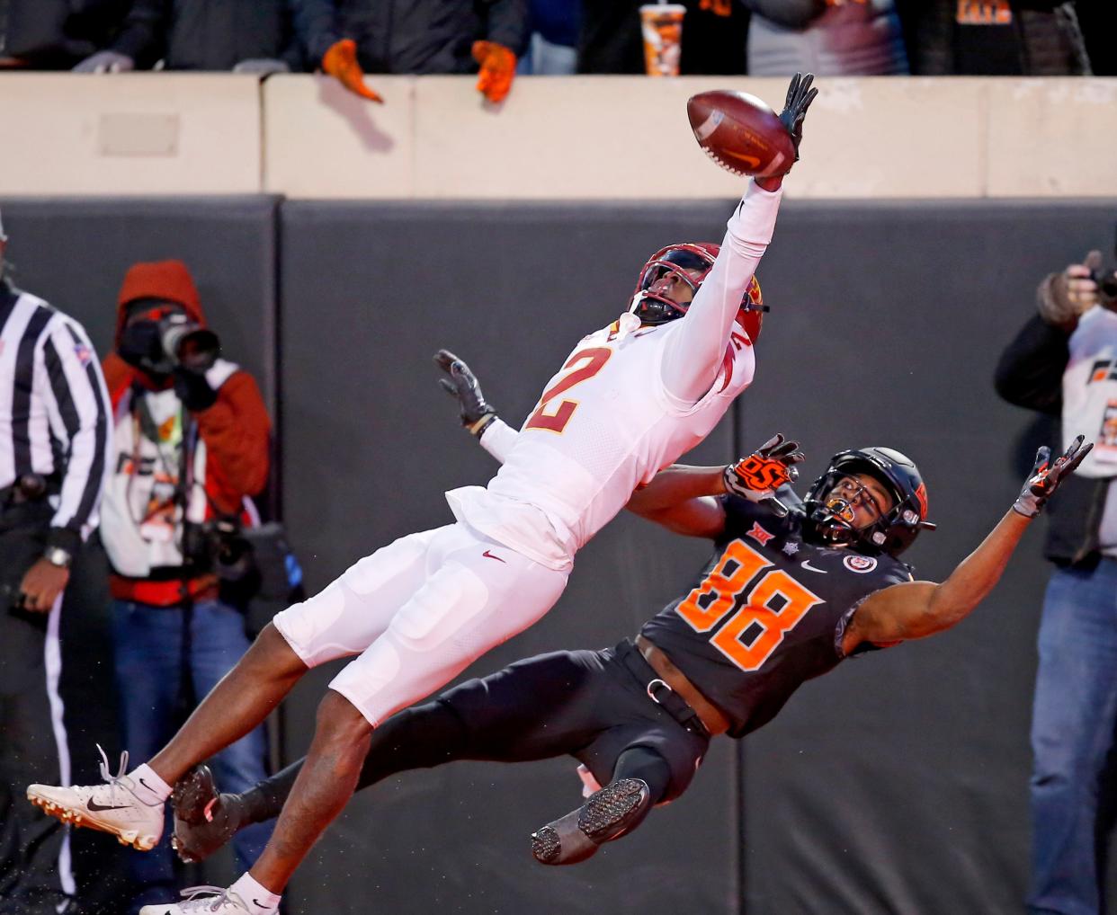 Nov 12, 2022; Stillwater, Oklahoma, USA; Iowa State Cyclones defensive back T.J. Tampa (2) deflects a pass intended for Oklahoma State Cowboys wide receiver Langston Anderson (88) in the fourth quarter at Boone Pickens Stadium. OSU won 20-14.