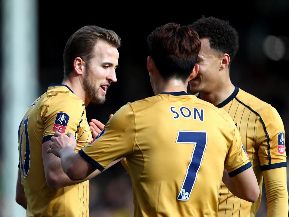 Harry Kane celebrates scoring his first goal of the afternoon at Craven Cottage (Getty)