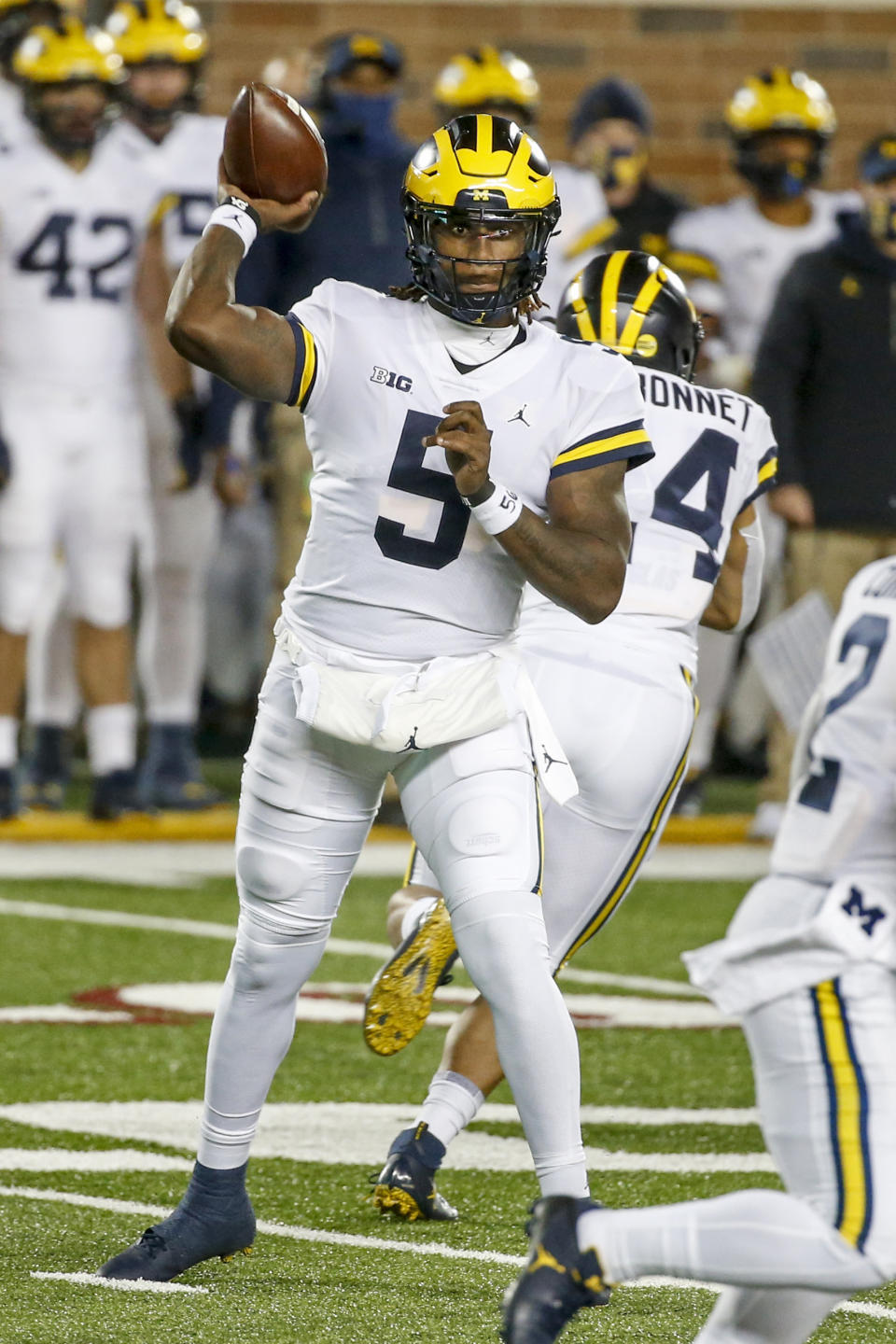 Michigan quarterback Joe Milton passes against Minnesota in the first quarter of an NCAA college football game Saturday, Oct. 24, 2020, in Minneapolis. (AP Photo/Bruce Kluckhohn)