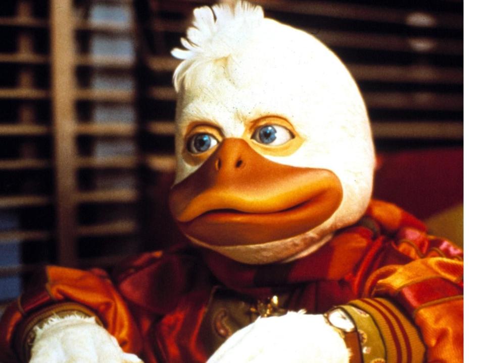 Howard the Duck in an orange bomber jacket