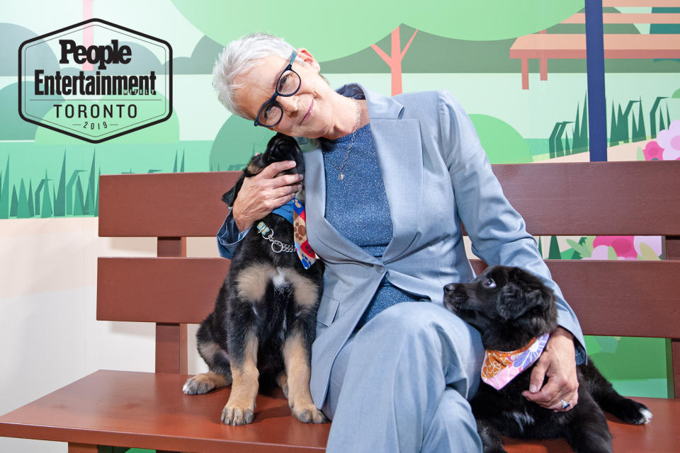 <p>We're going <em>mutts</em> over this photo of Jamie Lee Curtis with not one, but two pups. </p>