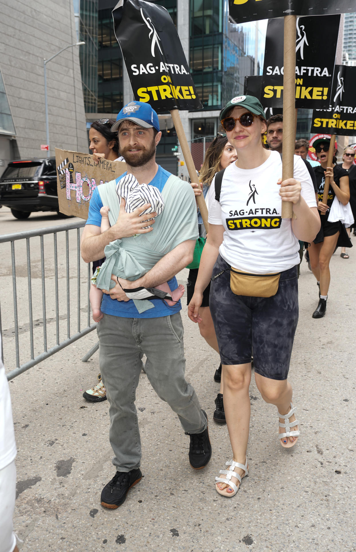Daniel Radcliffe and Erin Darke join the picket line in New York City on July 21, 2023. (John Nacion / Getty Images)