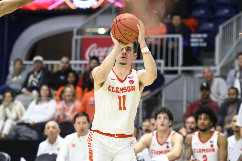 Clemson guard Joseph Girard III (11) looks to shoot from the 3-point line during second-half NCAA college basketball game action against TCU in the Hall of Fame Series in Toronto, Saturday, Dec. 9, 2023. (Christopher Katsarov/The Canadian Press via AP)