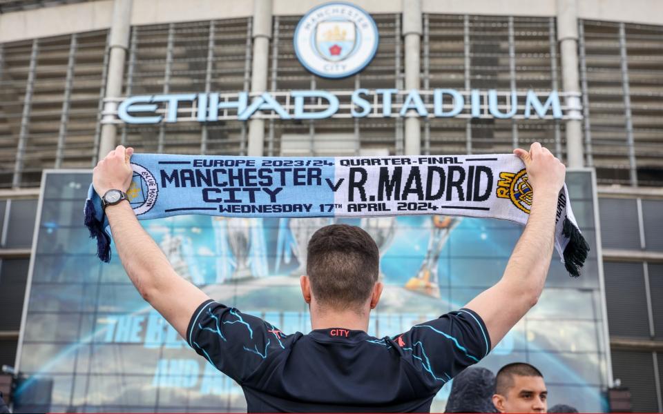 Fans arrive for the UEFA Champions League quarter-final second leg