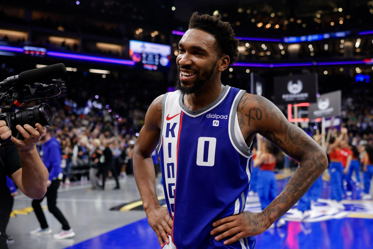 Sacramento Kings guard Malik Monk is interviewed after the Kings beat the Golden State Warriors to clinch at spot in the NBA in-season tournament knockout round at Golden 1 Center in Sacramento on Tuesday. (Sergio Estrada/USA TODAY Sports)