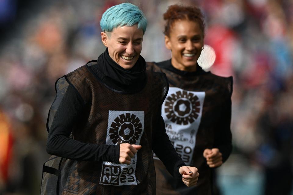 USA's Megan Rapinoe and Lynn Williams warm up during their match against Vietnam at Eden Park in Auckland, New Zealand.
