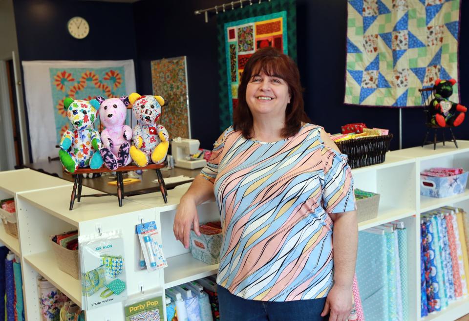 Somerset's Tammy Ruggeri, owner of Puddle Jumper Quilts in Dighton, at the new store on Friday, May 6, 2022. Puddle Jumper Quilts offers quilting fabrics, supplies, lessons and support and specializes in custom-design quilts and memory bears.   