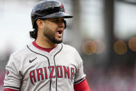 Arizona Diamondbacks' Eugenio Suárez reacts after striking out during the second inning of a baseball game against the Cincinnati Reds Tuesday, May 7, 2024, in Cincinnati. (AP Photo/Jeff Dean)