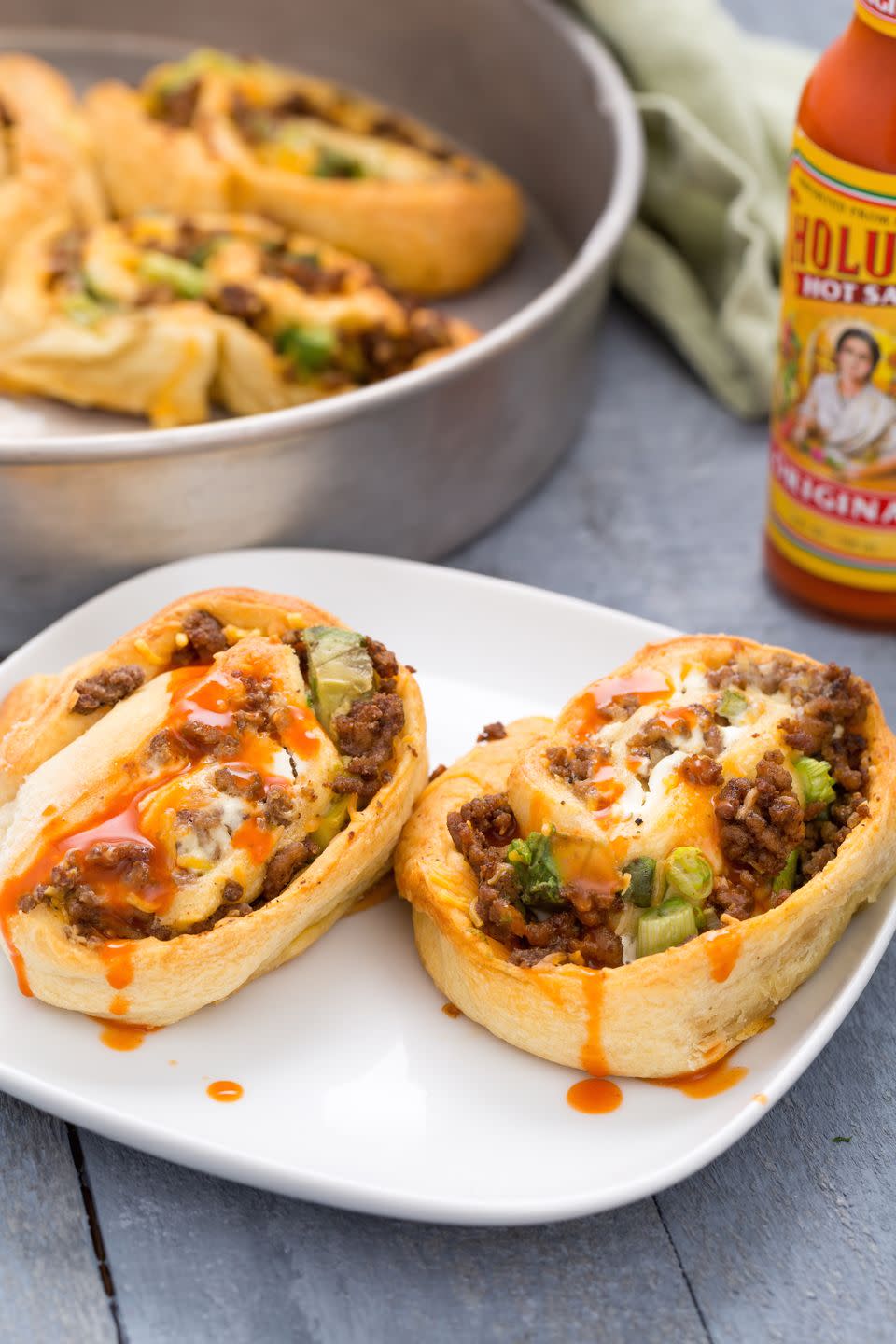 <p>Anything tortillas can do, crescent rolls can do better.</p><p>Get the recipe from <a href="http://www.delish.com/cooking/recipe-ideas/recipes/a44344/beef-taco-roll-ups-recipe/" rel="nofollow noopener" target="_blank" data-ylk="slk:Delish" class="link ">Delish</a>.</p>