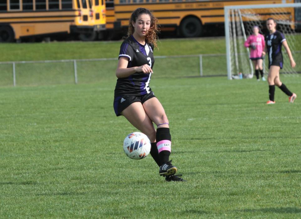 Summer Morrill of Three Rivers blasts a free kick into the back of the net to score a goal for the Lady Wildcats on Monday.