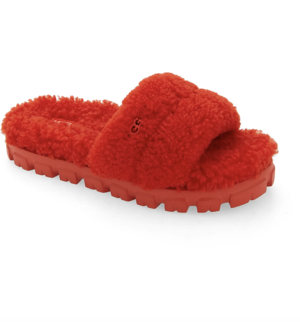 Ugg Cozetta Curly Genuine Shearling Slide Slipper in red pepper (Photo via Nordstrom)