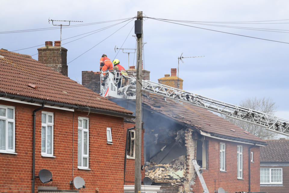 <p>Emergency services work at the scene of a house fire in Mill View in Willesborough, near Ashford, Kent following a reported explosion. Picture date: Tuesday May 4, 2021.</p>
