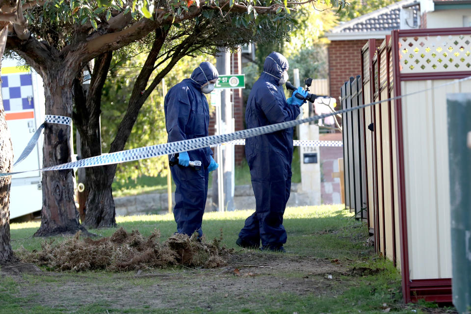 Forensic police officers are seen inspecting a property in Bedford, Perth, on Sunday, September 9, 2018. Source: AAP