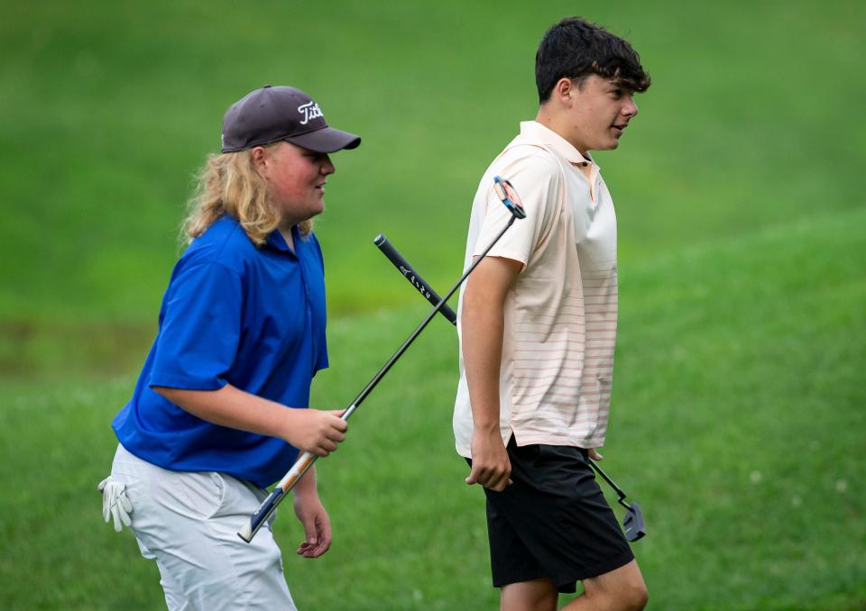 Peyton Woods, left, and Jake Baldin, right, walk up to the tee box on the No. 5 hole in the Championship Flight for the Kone Elevator Drysdale Junior Golf Tournament at Bunn Golf Course in Springfield, Ill., Thursday, July 15, 2021. [Justin L. Fowler/The State Journal-Register] 