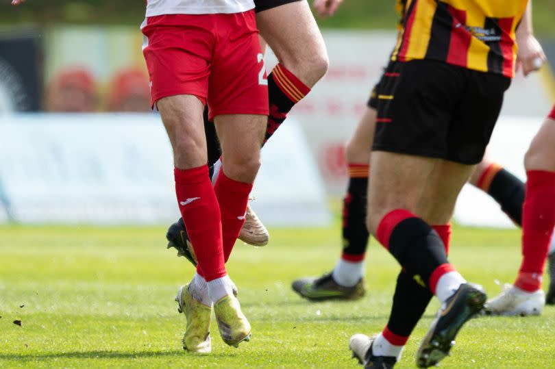 Airdrie's Gabby McGill is challenged during the Championship clash in Maryhill