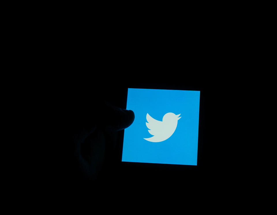 In this photo illustration the Twitter   logo is seen displayed on smartphone screen (Photo by Giannis Alexopoulos/NurPhoto via Getty Images)