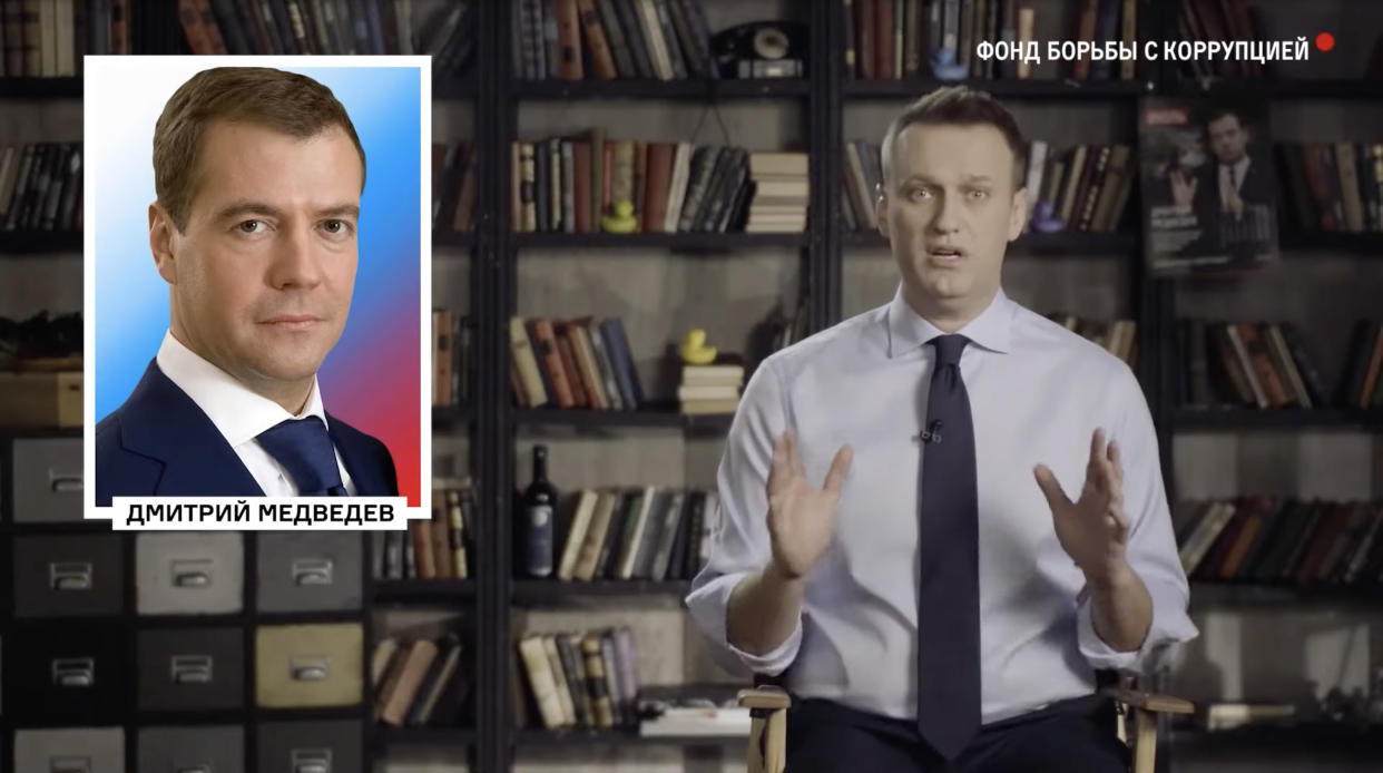 Alexander Navalny and an inset of Medvedev in a still from Navalny's documentary. 