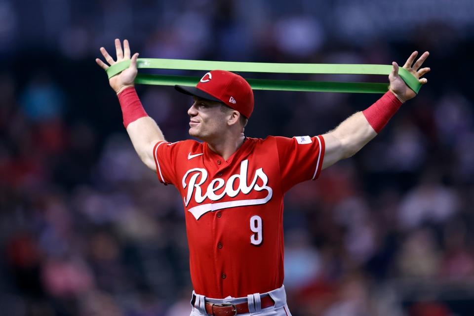 Matt McLain #9 of the Cincinnati Reds prepares for the game against the Arizona Diamondbacks at Chase Field on Aug. 27, 2023.