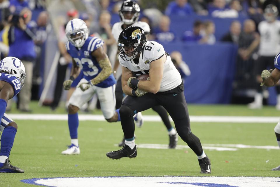 Jacksonville Jaguars tight end Blake Bell (87) runs after a catch against the Indianapolis Colts during the second half of an NFL football game in Indianapolis, Sunday, Nov. 11, 2018. (AP Photo/Darron Cummings)