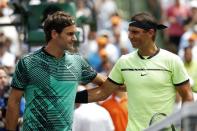 Apr 2, 2017; Key Biscayne, FL, USA; Roger Federer of Switzerland (L) and Rafael Nadal of Spain (R) prior to their match in the men's singles championship of the 2017 Miami Open at Crandon Park Tennis Center. Mandatory Credit: Geoff Burke-USA TODAY Sports