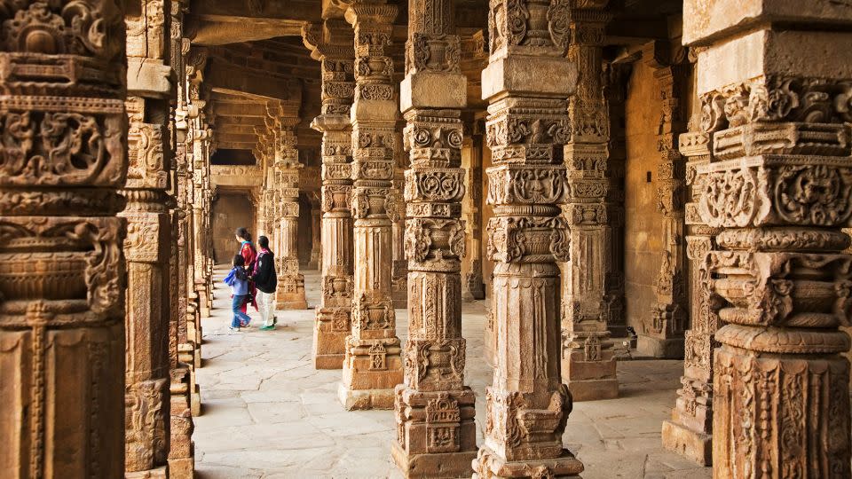 The Quwwat-ul-Islam mosque is part of the UNESCO-listed Qutb Minar complex. - Anders Blomqvist/The Image Bank Unreleased/Getty Images