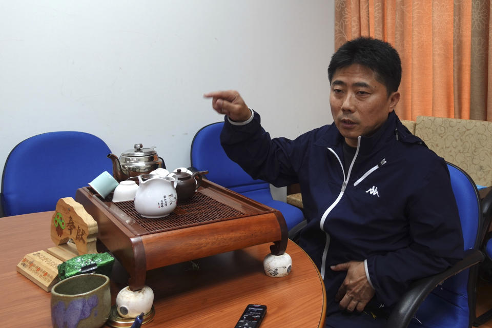 Chen Shih-wei, director of the Matsu Sports Association, speaks during an interview on the Matsu Islands, Taiwan on March 7, 2023. For Chen Shih-wei, who calls himself both Taiwanese and Chinese, cultural and emotional ties to China are strong. Chen's family immigrated to Taiwan during the Ming dynasty. (AP Photo/Johnson Lai)