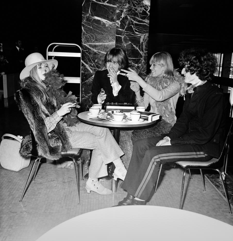 Rolling Stones guitarist Brian Jones with his girlfriend actress Anita Pallenberg and Marianne Faithfull at Heathrow Airport, 11th March 1967. They are there to to fly to Tangiers with other members of the band. (Photo by Dove/Express/Getty Images)