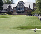 Joohyung Kim, of South Korea, hits to the ninth hole during the final round of the Wyndham Championship golf tournament in Greensboro, N.C., Sunday, Aug. 7, 2022. (AP Photo/Chuck Burton)