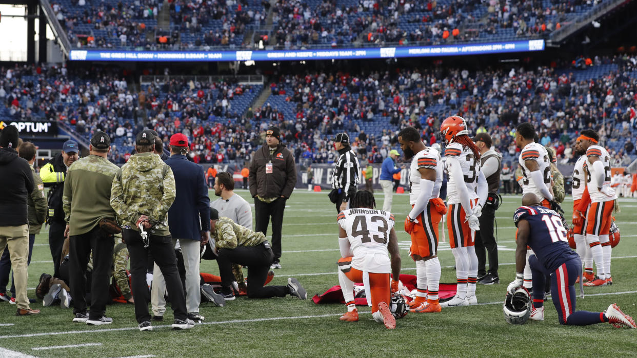 Cleveland Browns cornerback Troy Hill being attended to by medical staff