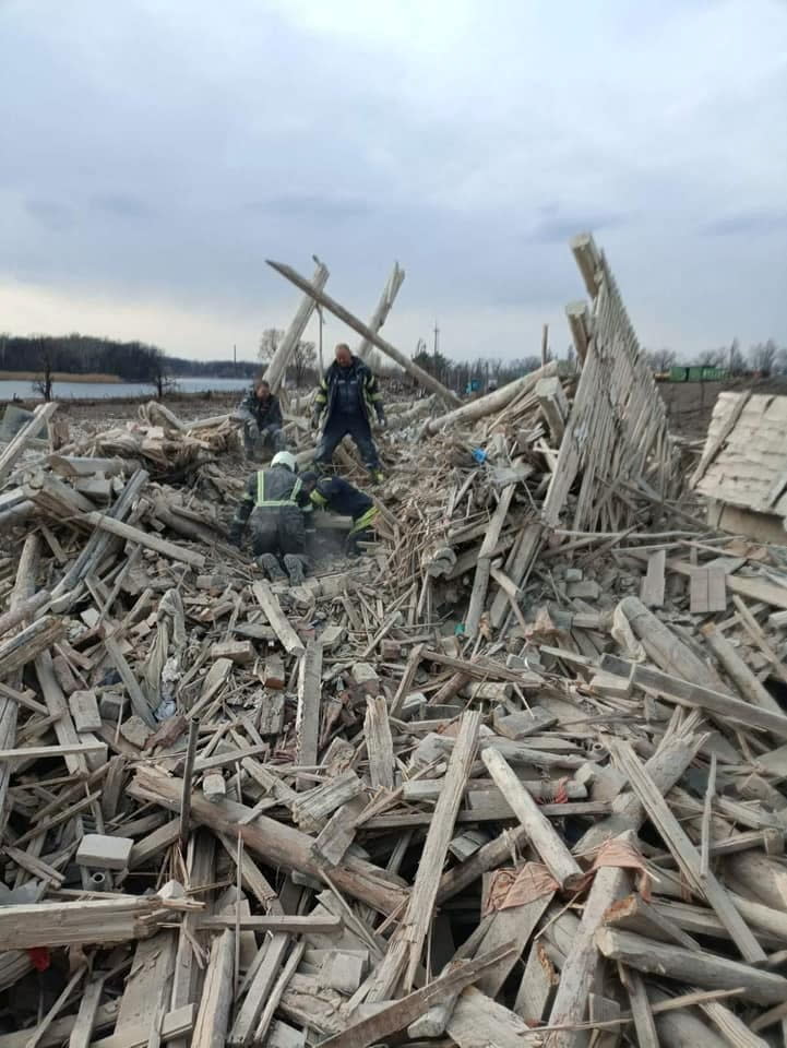 Rescuers remove a woman from debris after a military strike, as Russia's attack on Ukraine continues, in the town of Rubizhne, in Luhansk region, Ukraine April 6, 2022. Press service of the State Emergency Service of Ukraine/Handout via REUTERS THIS IMAGE HAS BEEN SUPPLIED BY A THIRD PARTY.