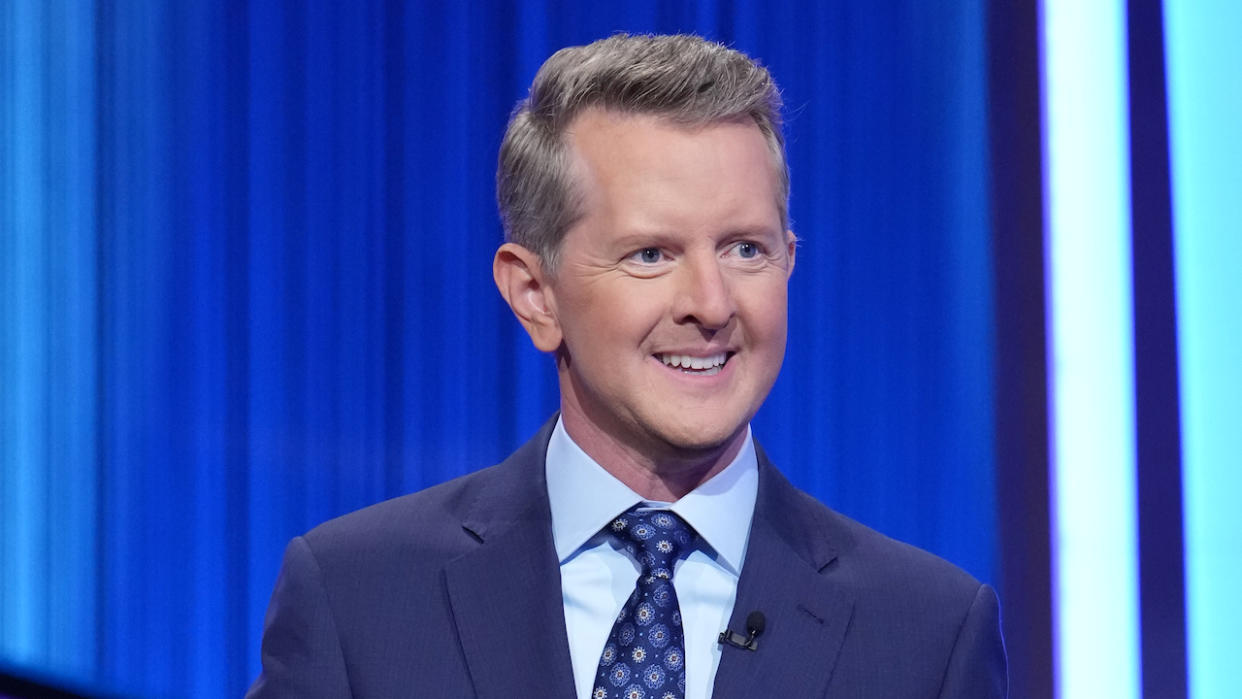  Ken Jennings in navy jacket hosting Celebrity Jeopardy. 