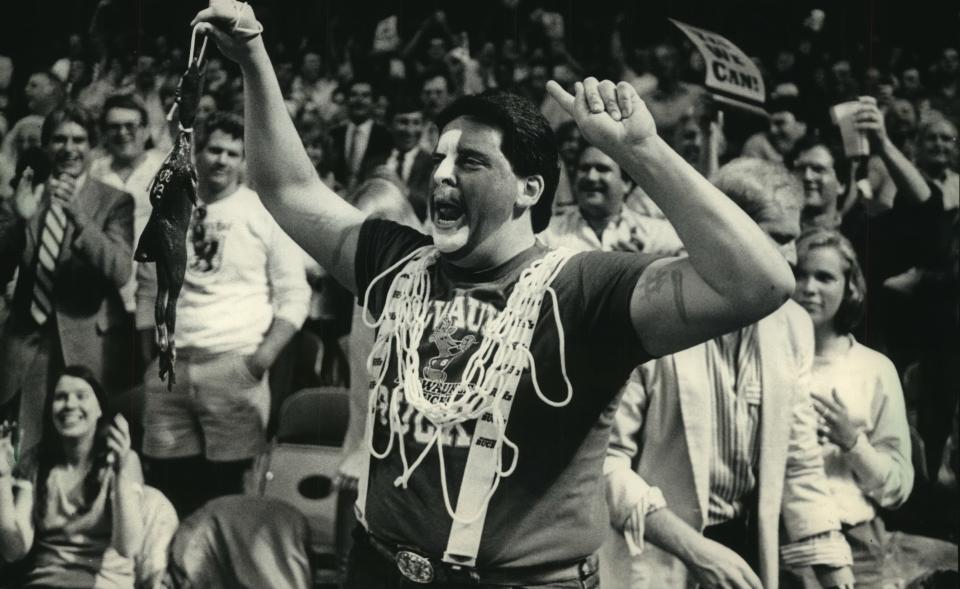Bucks fan Mike Guenette painted his face and wore a basketball net for Game 6 of the Eastern Conference semifinals in 1987 against the Celtics.