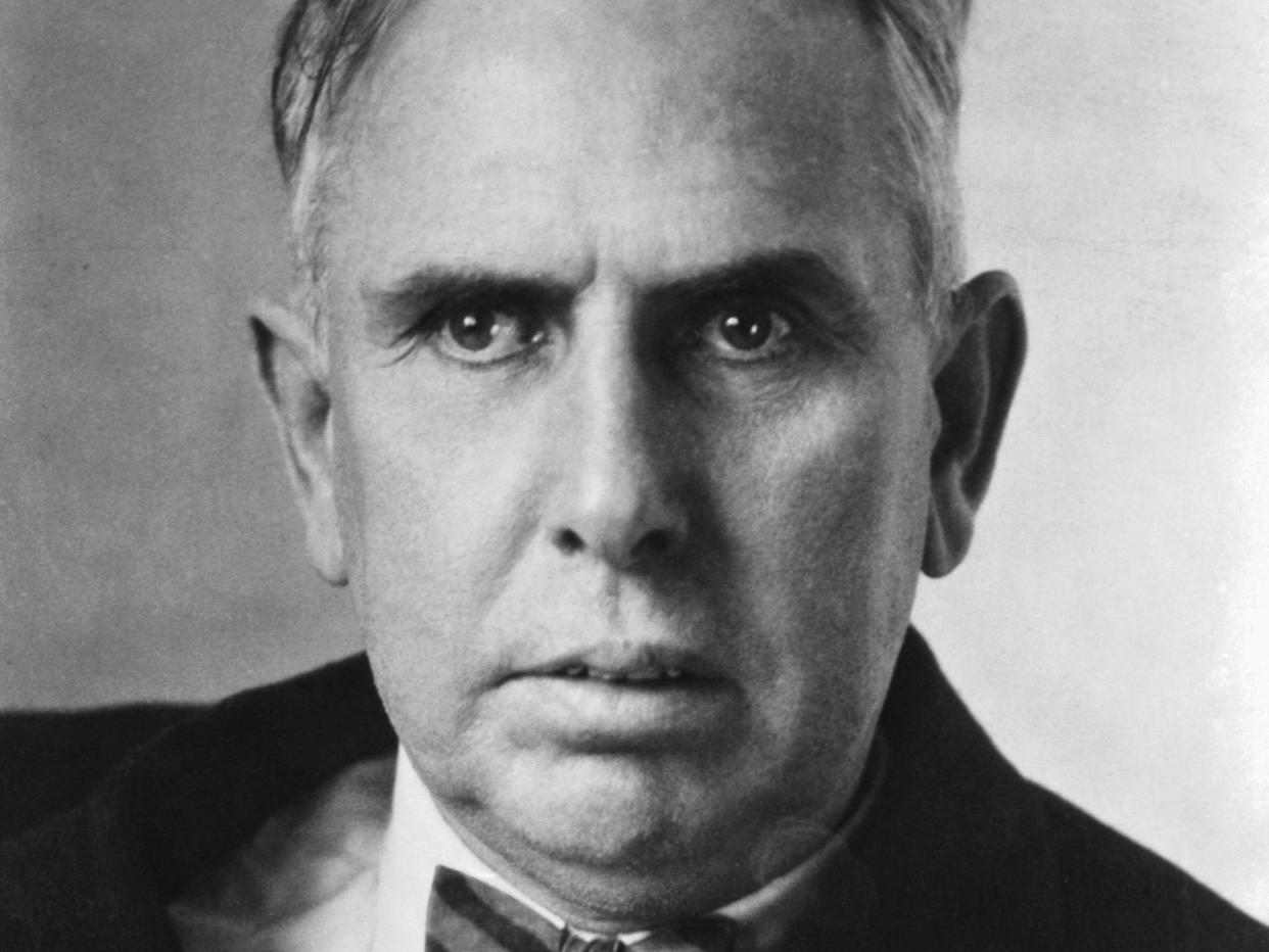 A Portrait of Theodore Dreiser wearing a suit with a bowtie.